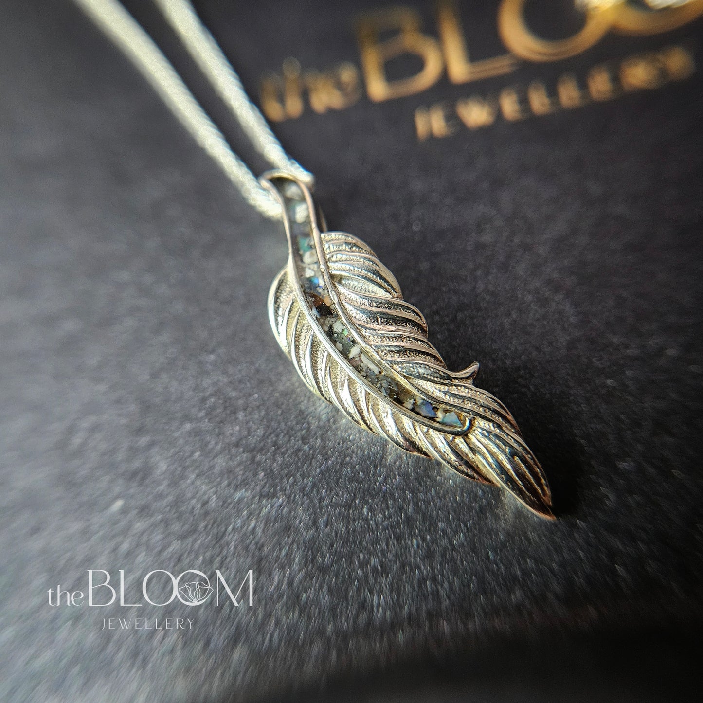 Feather keepsake necklace