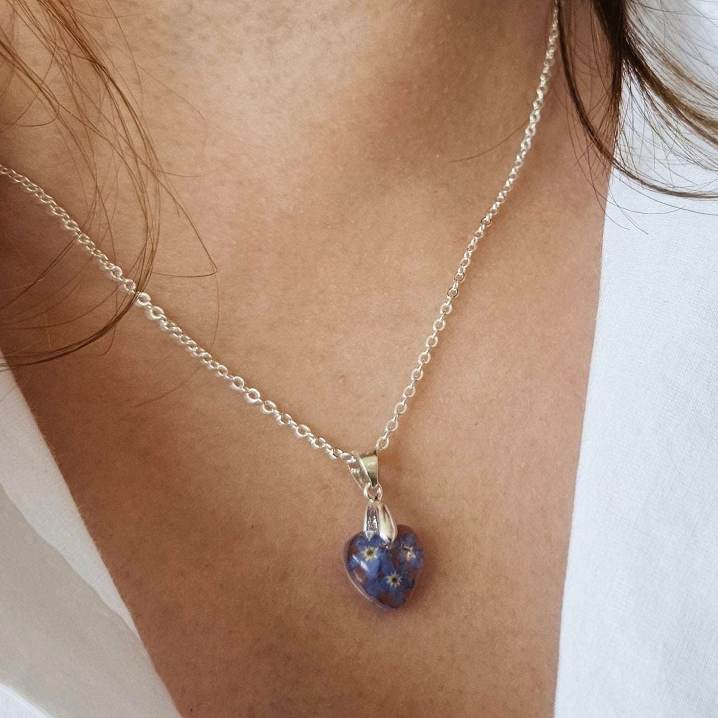 necklace with forget me not flowers