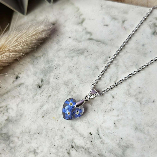 necklace with forget me not flowers