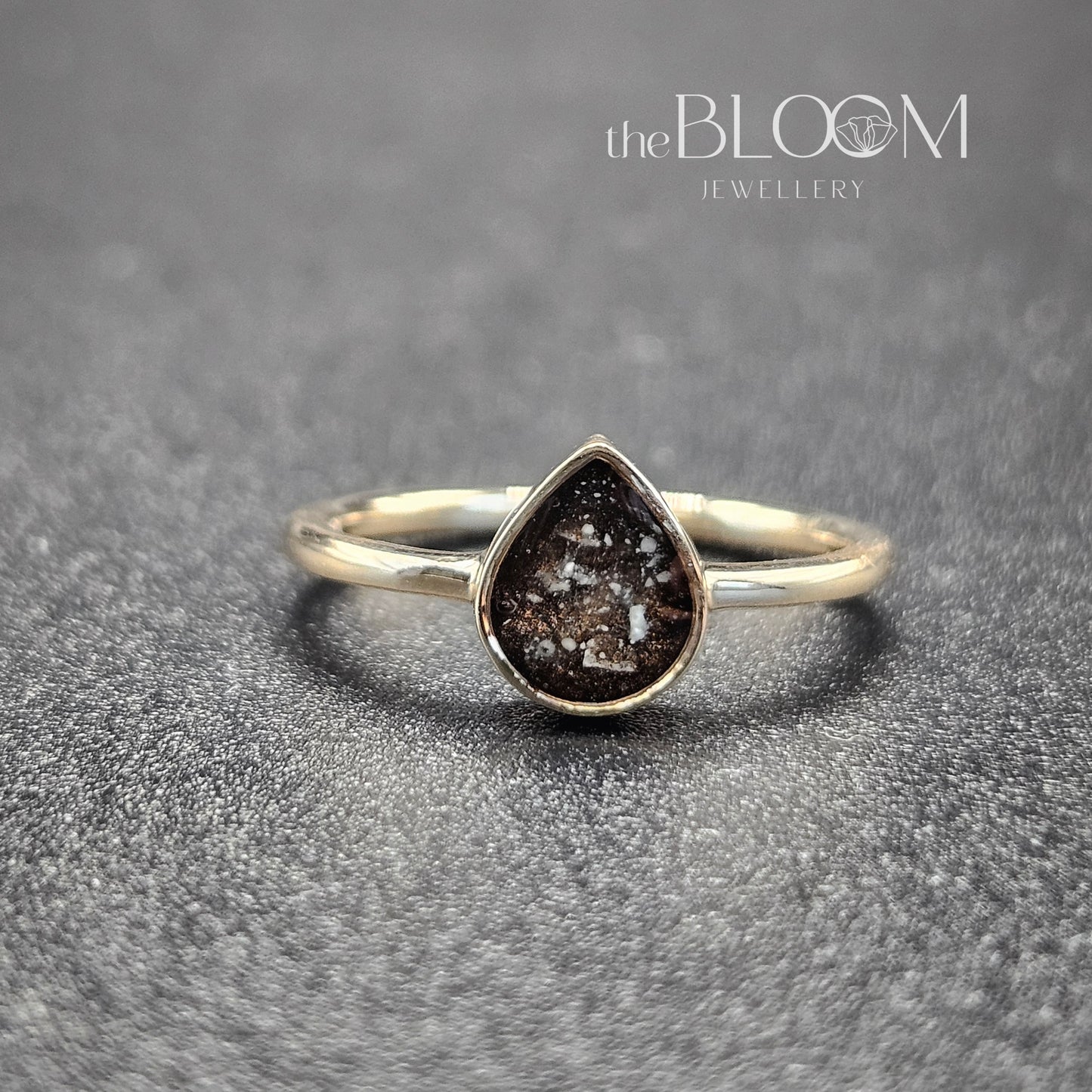 gold teardrop ring with ashes