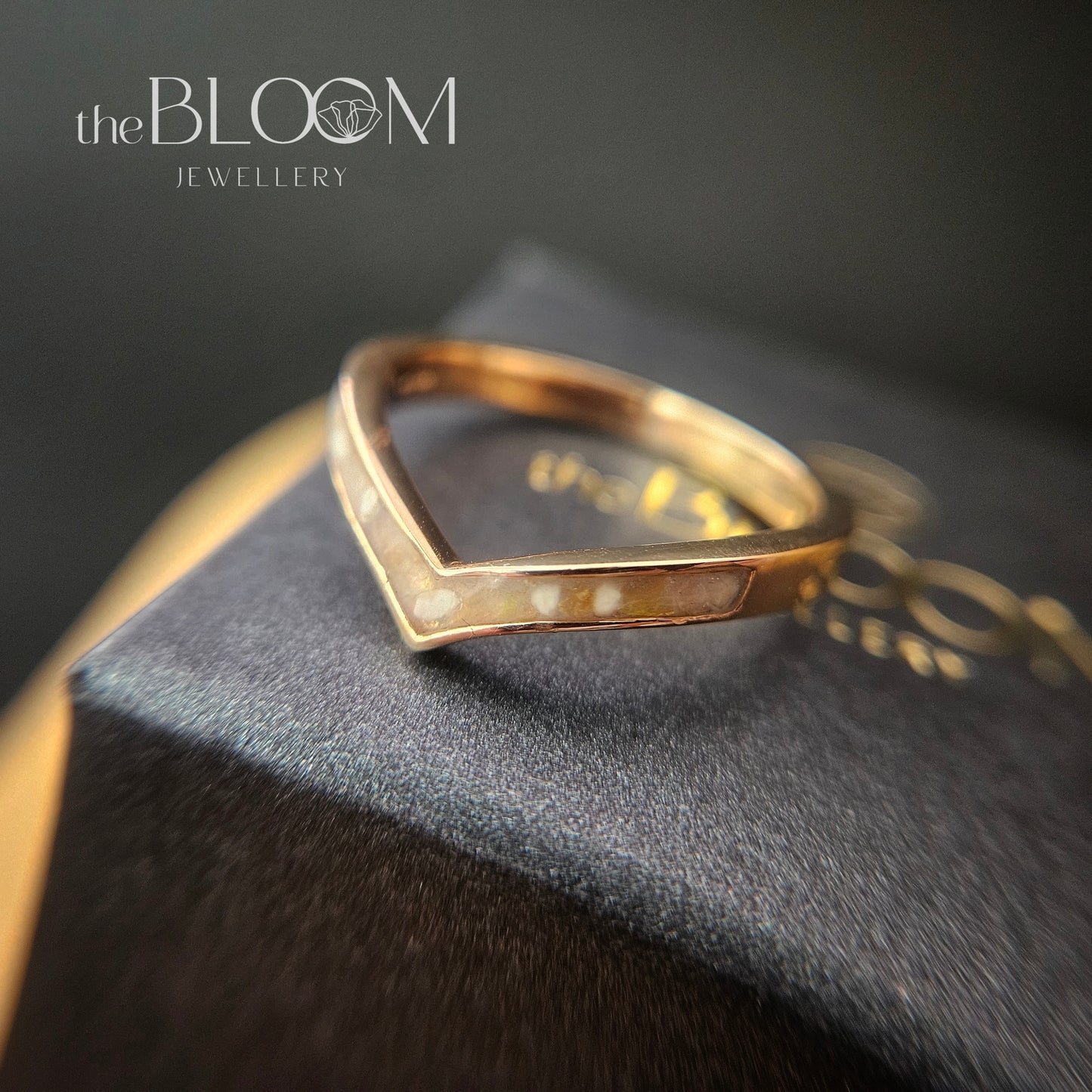 gold ring with cremation ashes