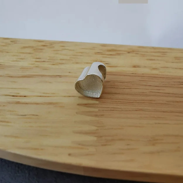 heart charm with ashes