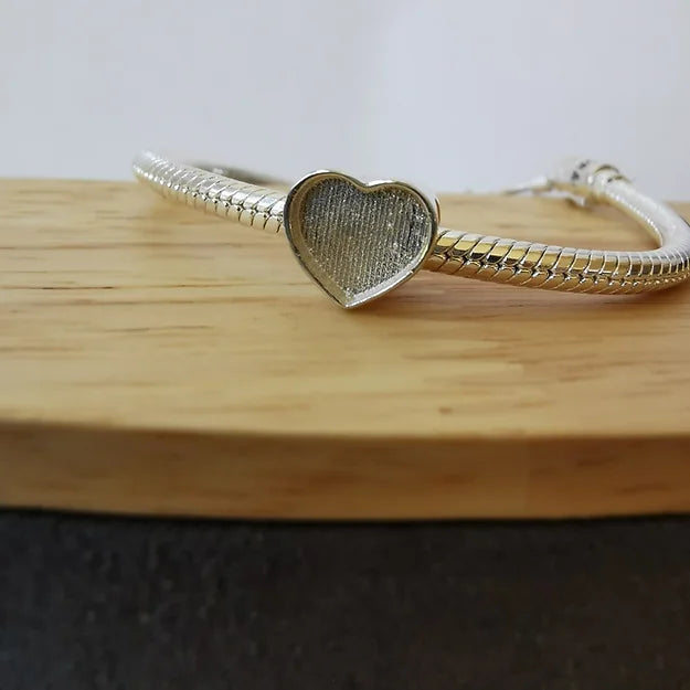 heart charm with ashes