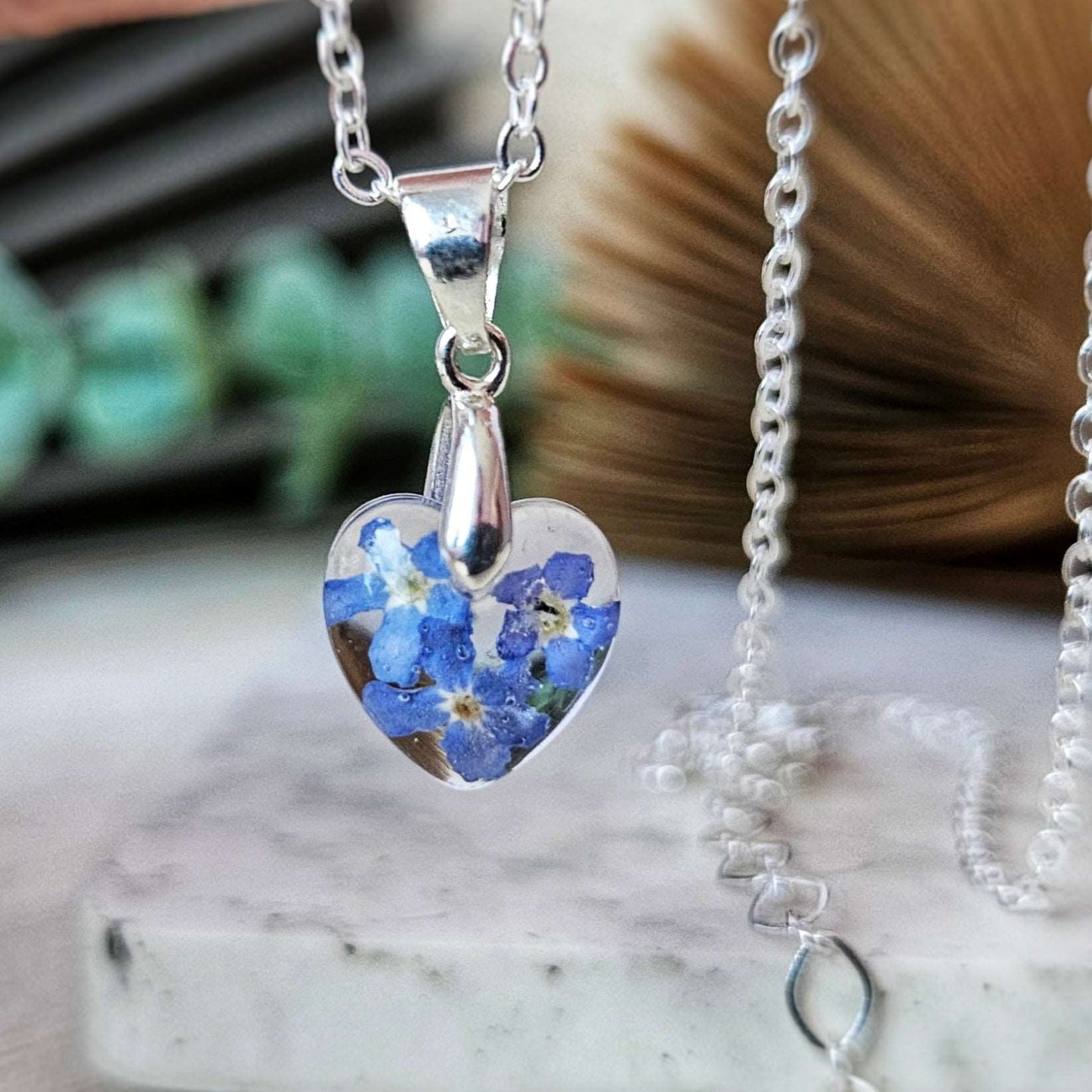 necklace with forget me not flowers