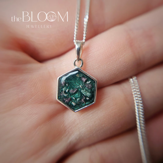 silver pendant with ashes