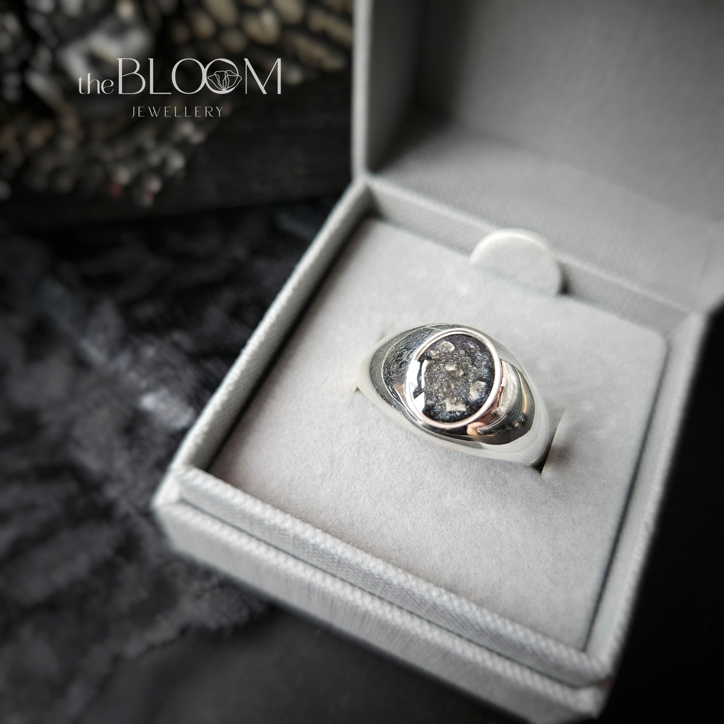 silver signet with ashes