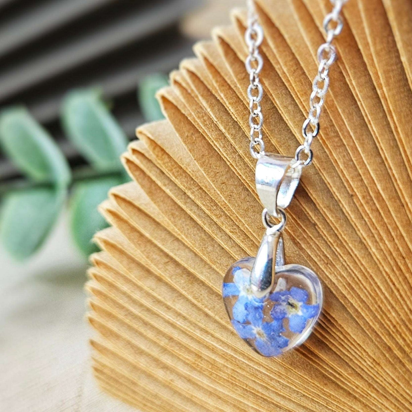necklace with forget me not flowers