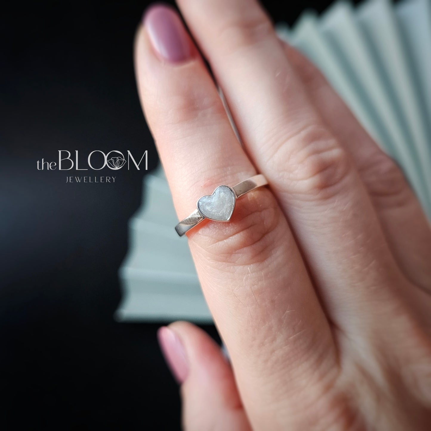 silver heart ring with ashes