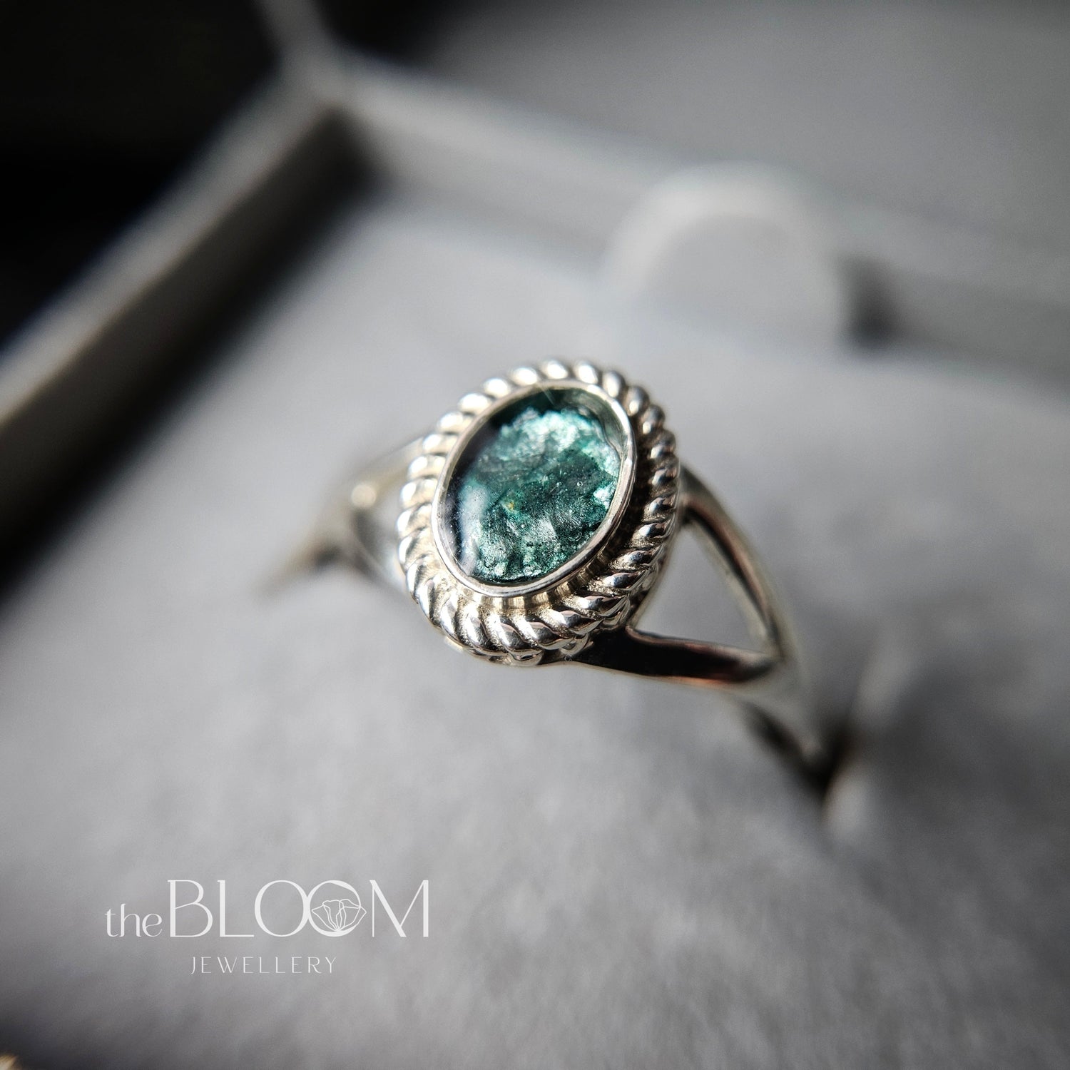 silver ring with ashes
