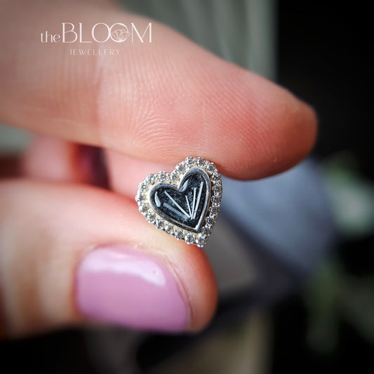 bracelet charm in shape of heart with fur inside the stone