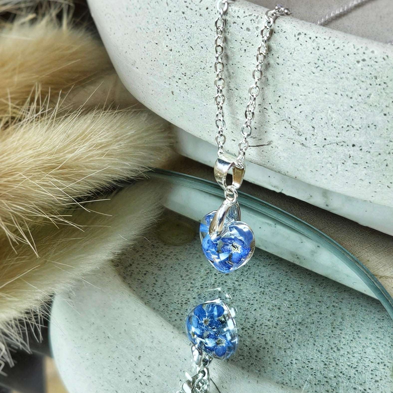 necklace with forget me not flowers