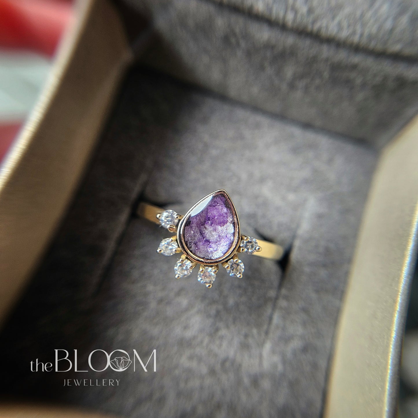 raindrop gold keepsake ring