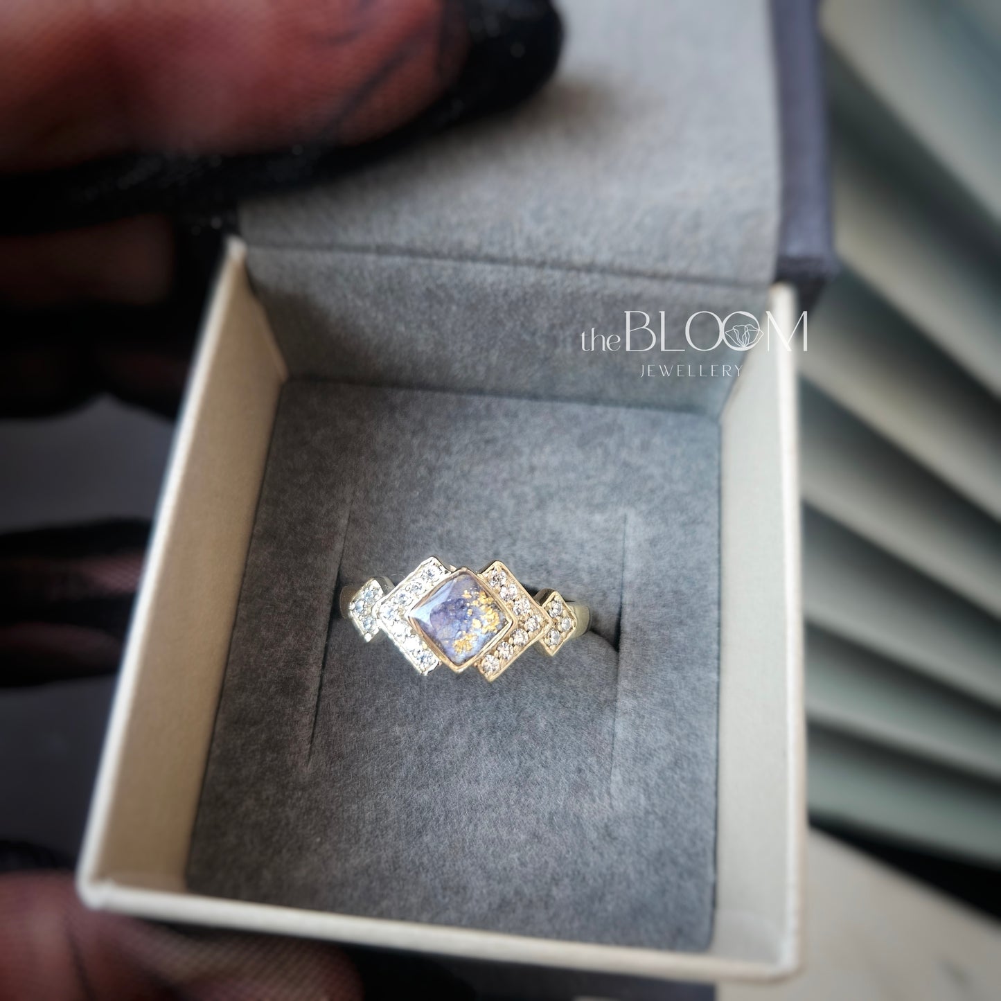 gold ring with cremation ashes