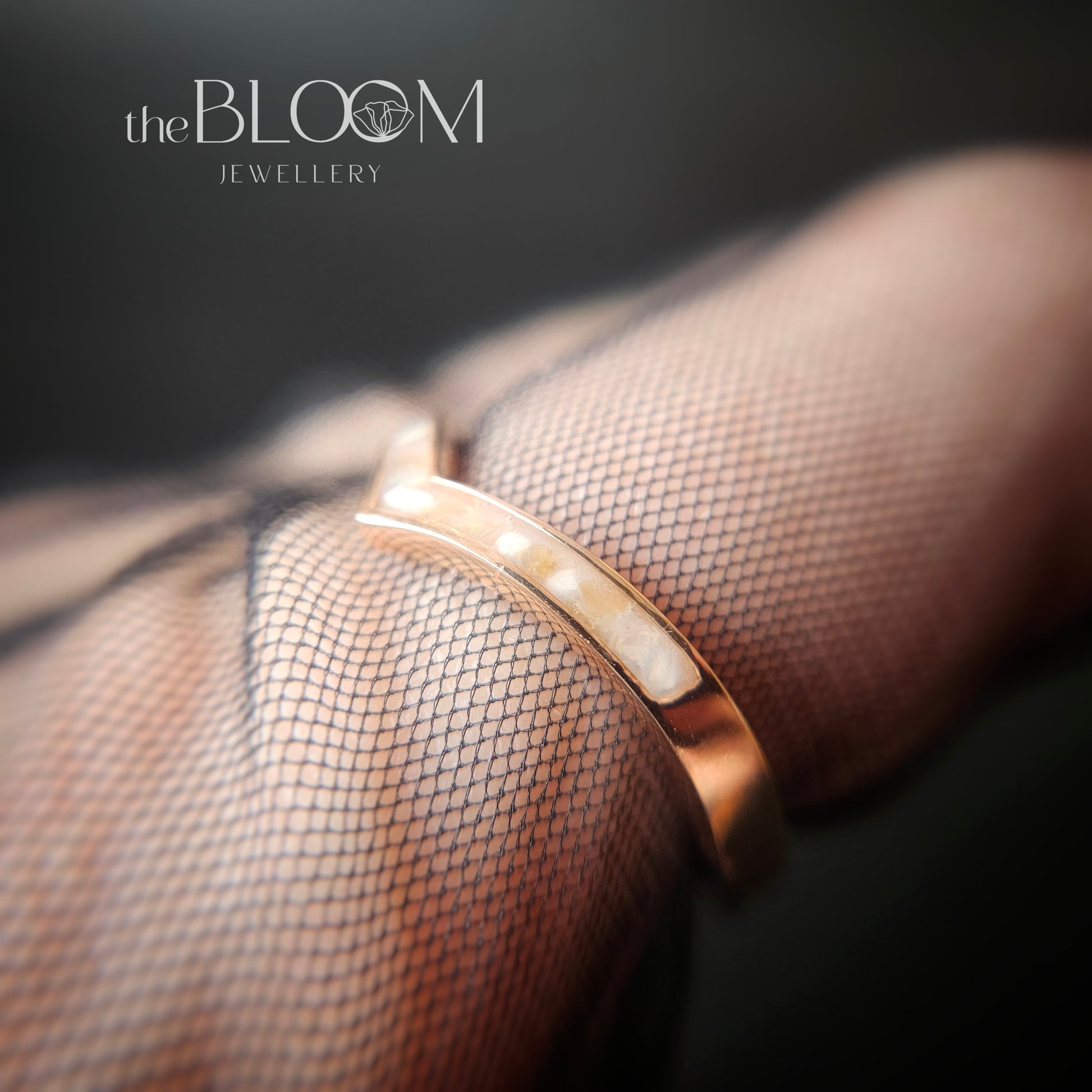 gold ring with cremation ashes