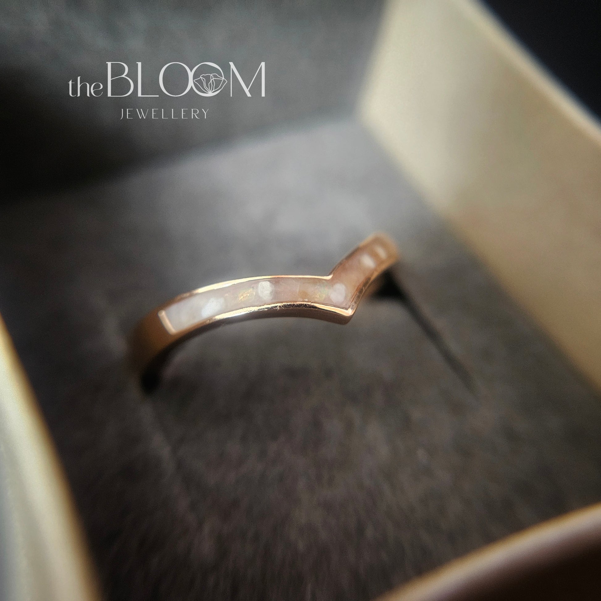 gold ring with cremation ashes
