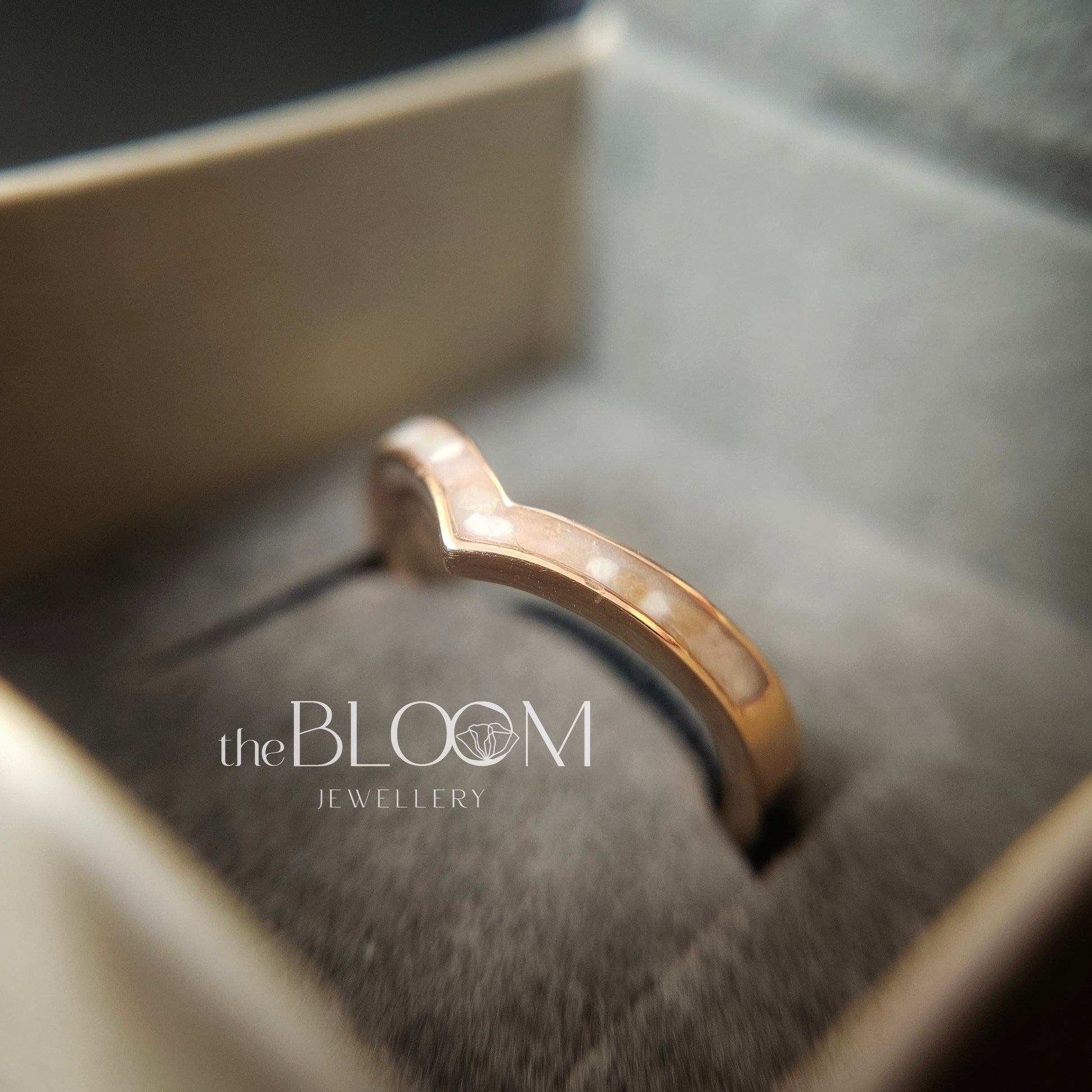 gold ring with cremation ashes