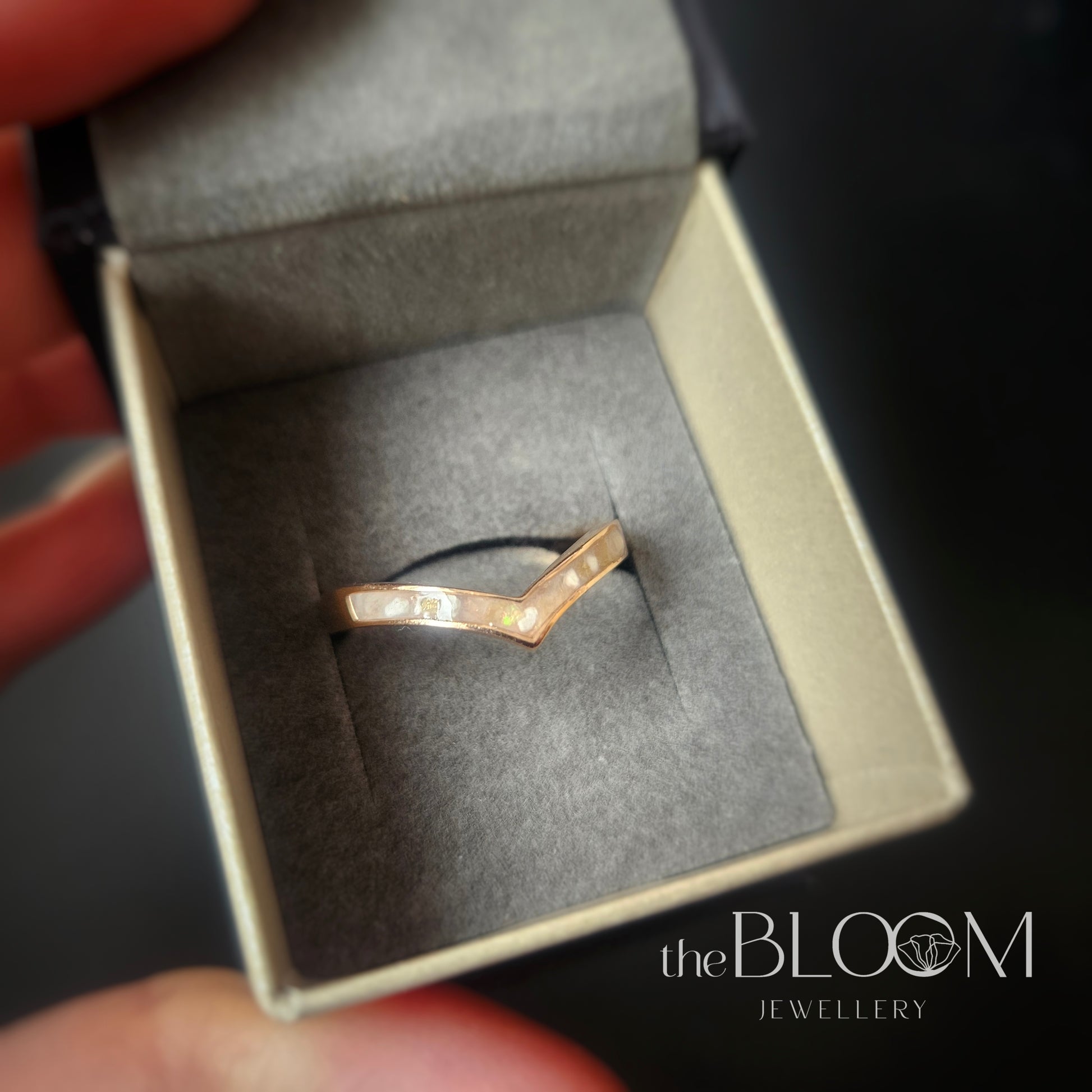 gold ring with cremation ashes