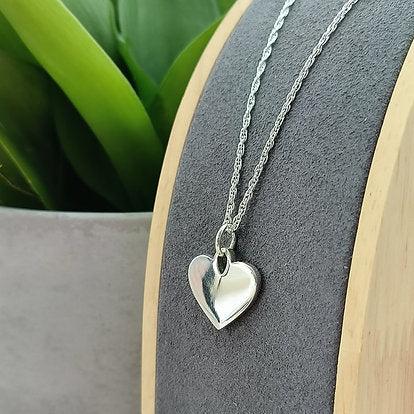 heart necklace with hand writing 