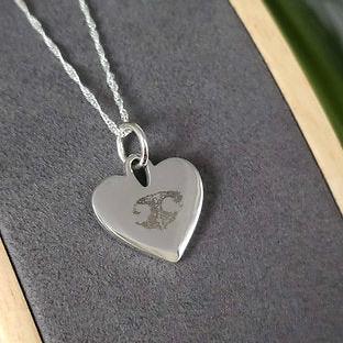 heart necklace with hand writing 