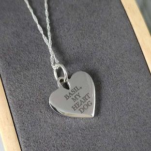 heart necklace with hand writing 