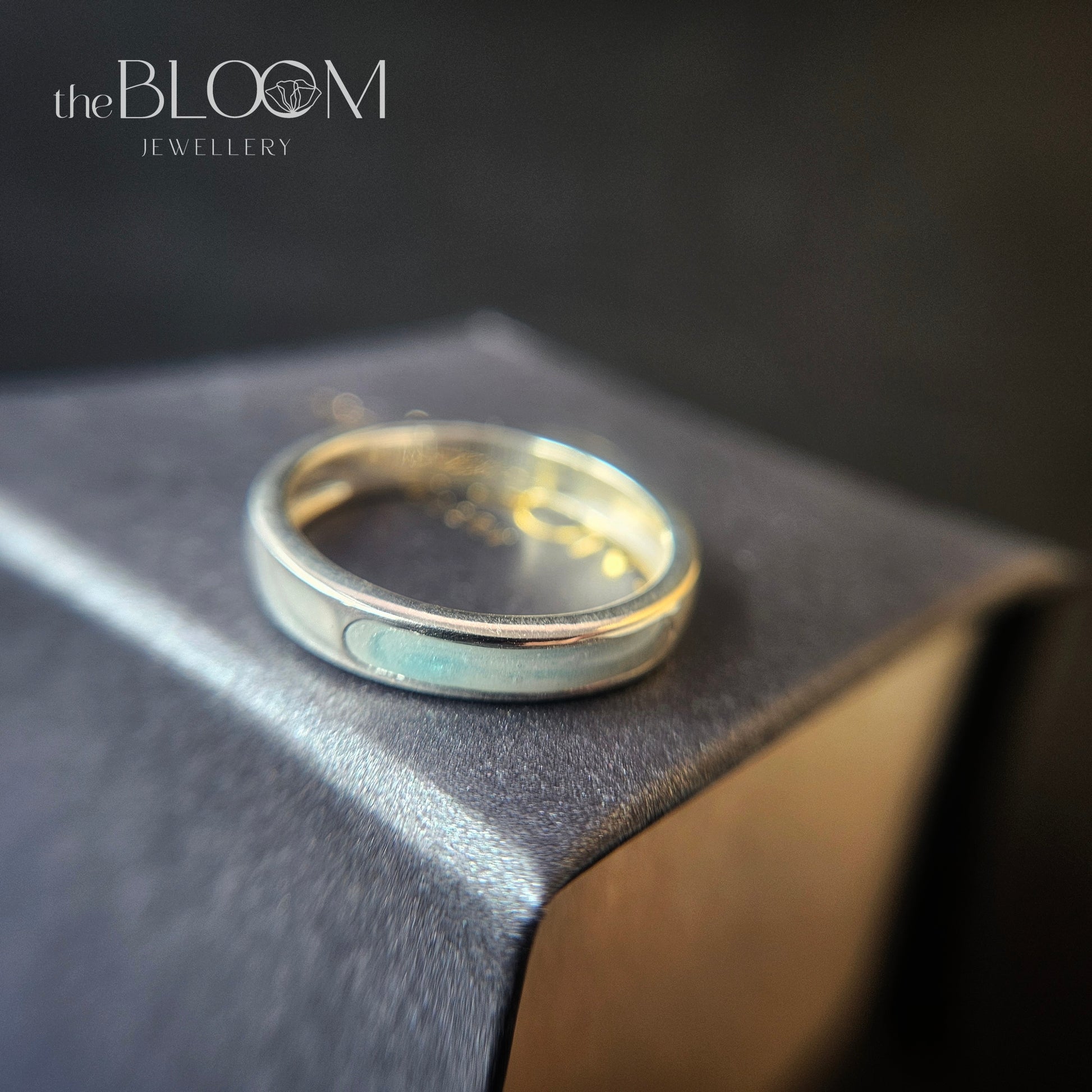 silver keepsake ring with breastmilk